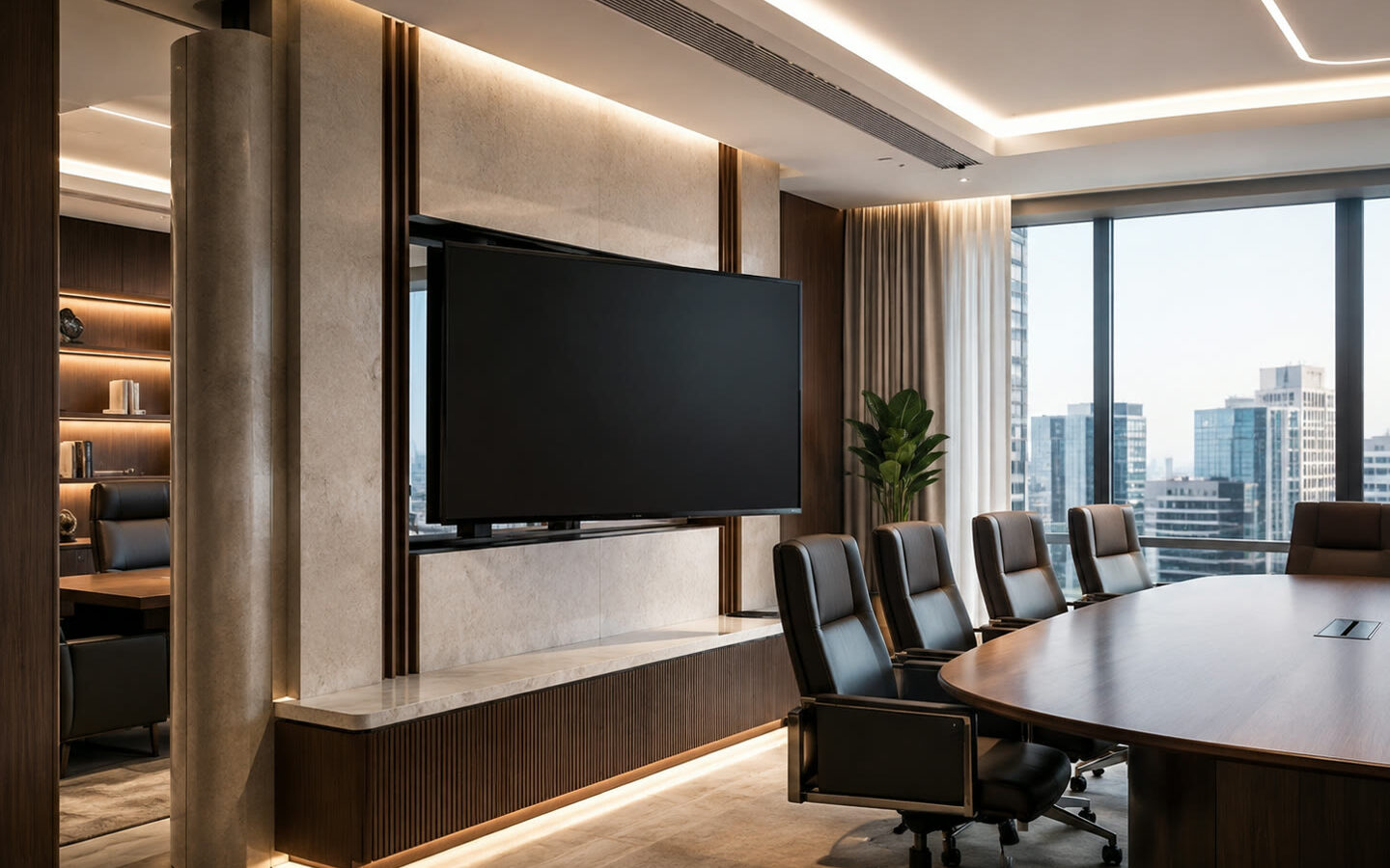 Motorised TV lift on a stone feature wall in an executive boardroom with a city view