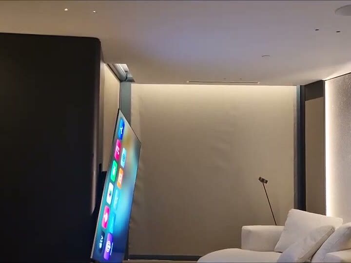 Motorised swivel TV rotating back towards the wall, showing the rotation range